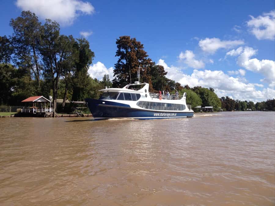 Tigre with Lunch overlooking the River and Navigation - Getting North: The Bus Ride Past University City and River Plate Stadium