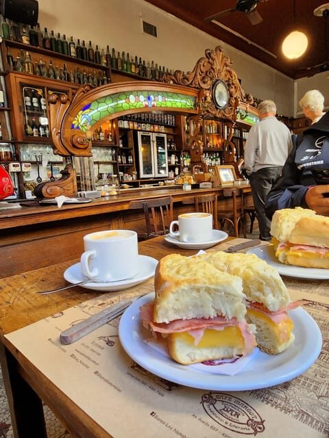 Walking Tour of San Telmo and La Boca with local food - Caminito Street: Markets, Street Life, and Choripan